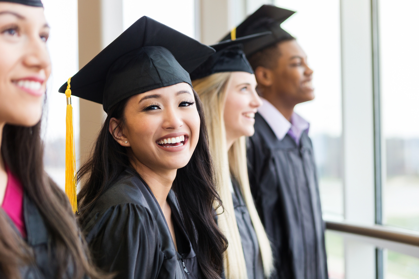 Happy female high school graduate